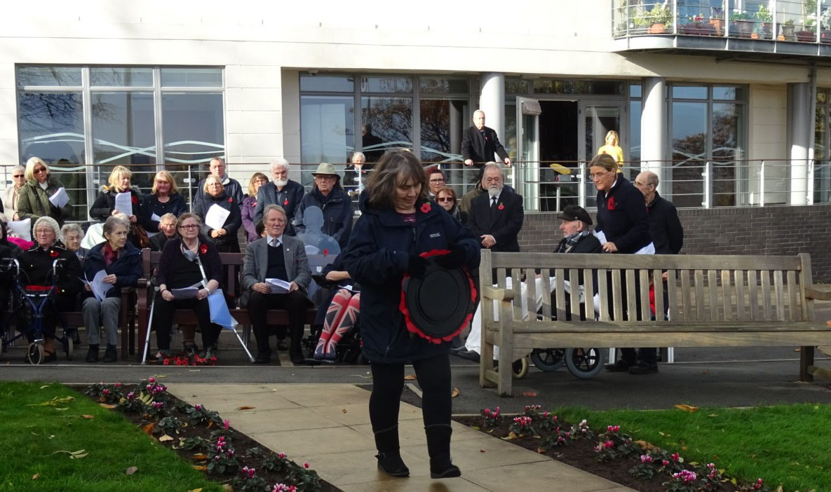 Longest-serving Mariners' Park staff member Karen Jones laid the red poppy wreath during the ceremony. Image:Longest-serving Mariners' Park staff member Karen Jones laid the red poppy wreath during the ceremony.